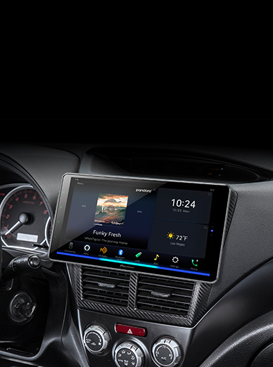 Interior view of car with a Pioneer receiver installed and music playing on screen