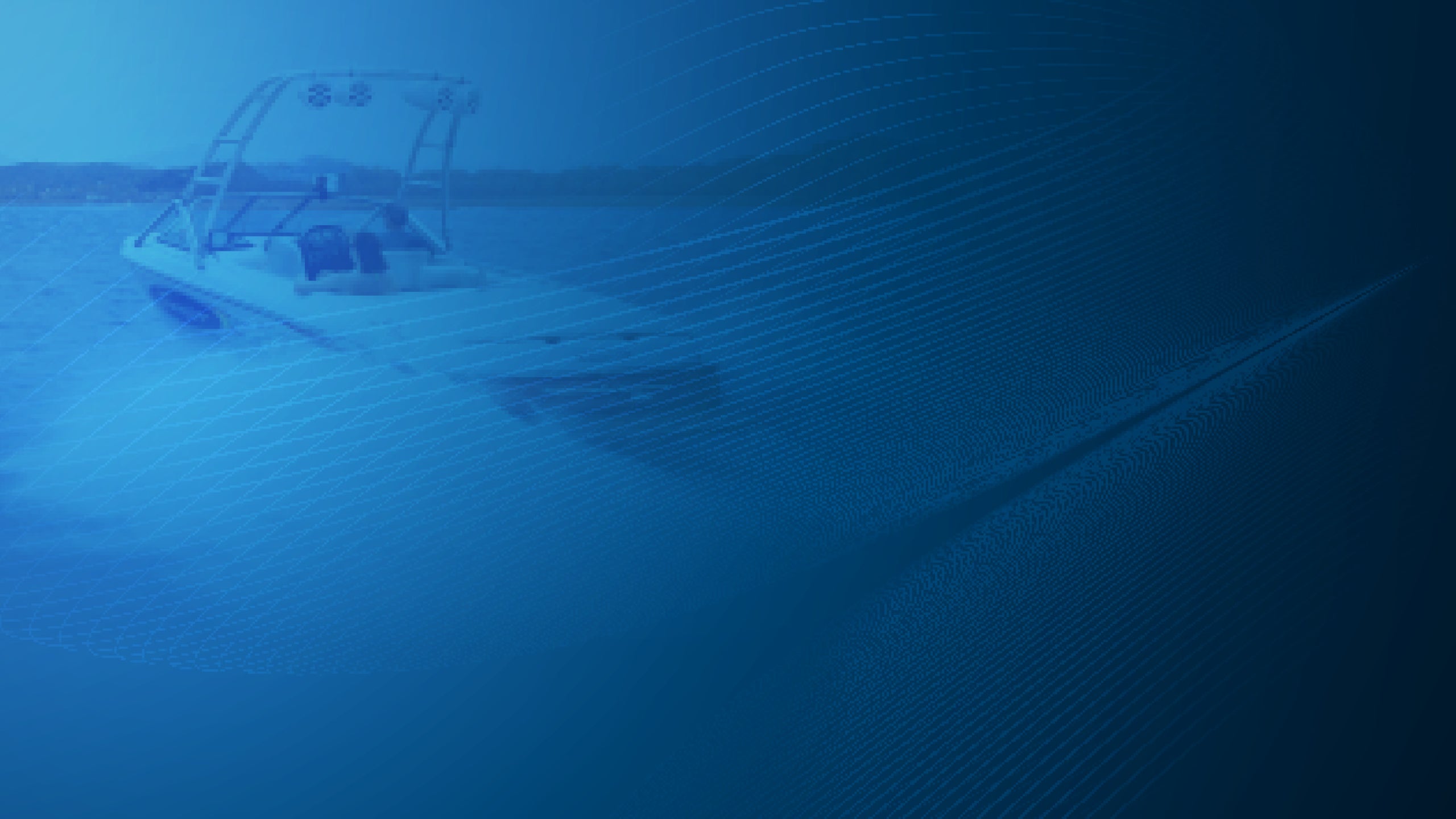 Small boat on a calm blue water surface