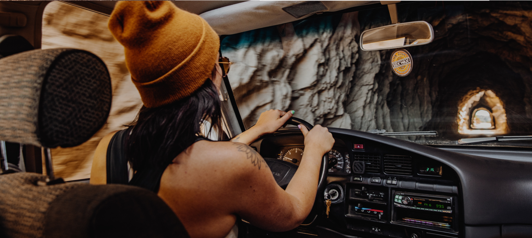 person driving through tunnel