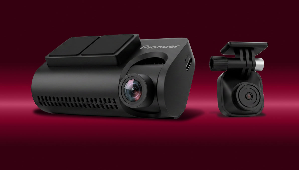 A black Pioneer dash cam with a matching mounting bracket, displayed on a dark red gradient background.