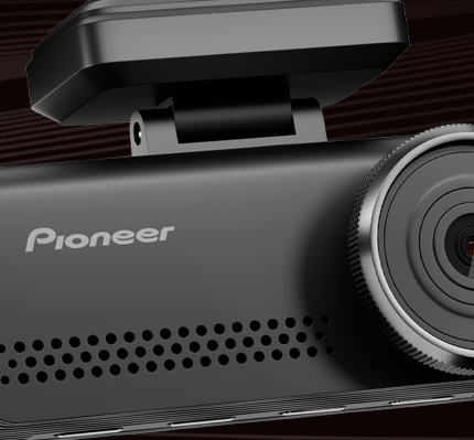 Pioneer dashboard camera with lens and bracket on a dark background