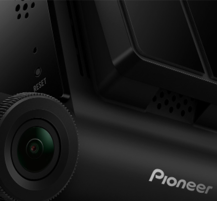 Close-up of a black camera device with 'Pioneer' branding