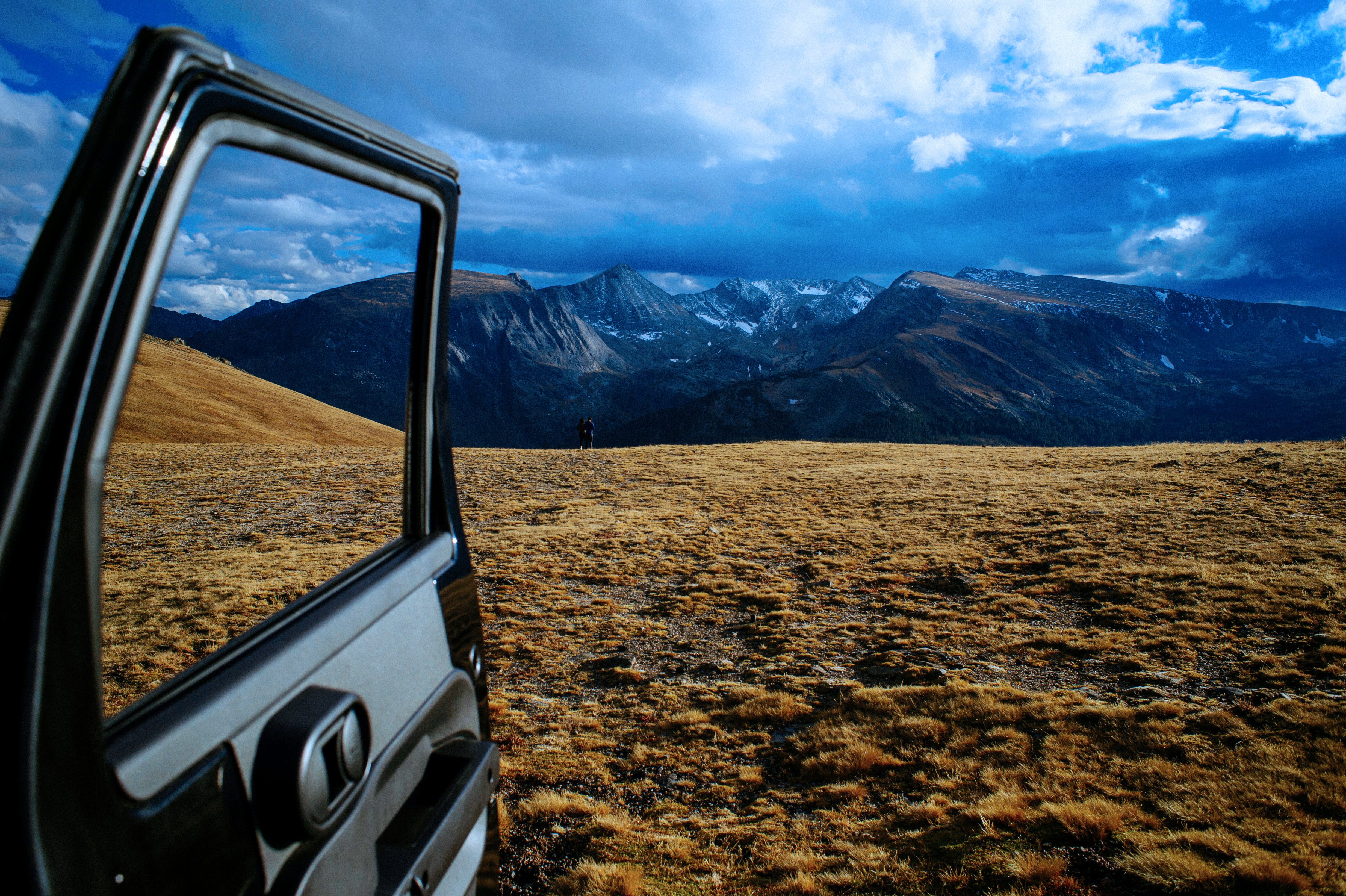 car door opening up to a beautiful landscape