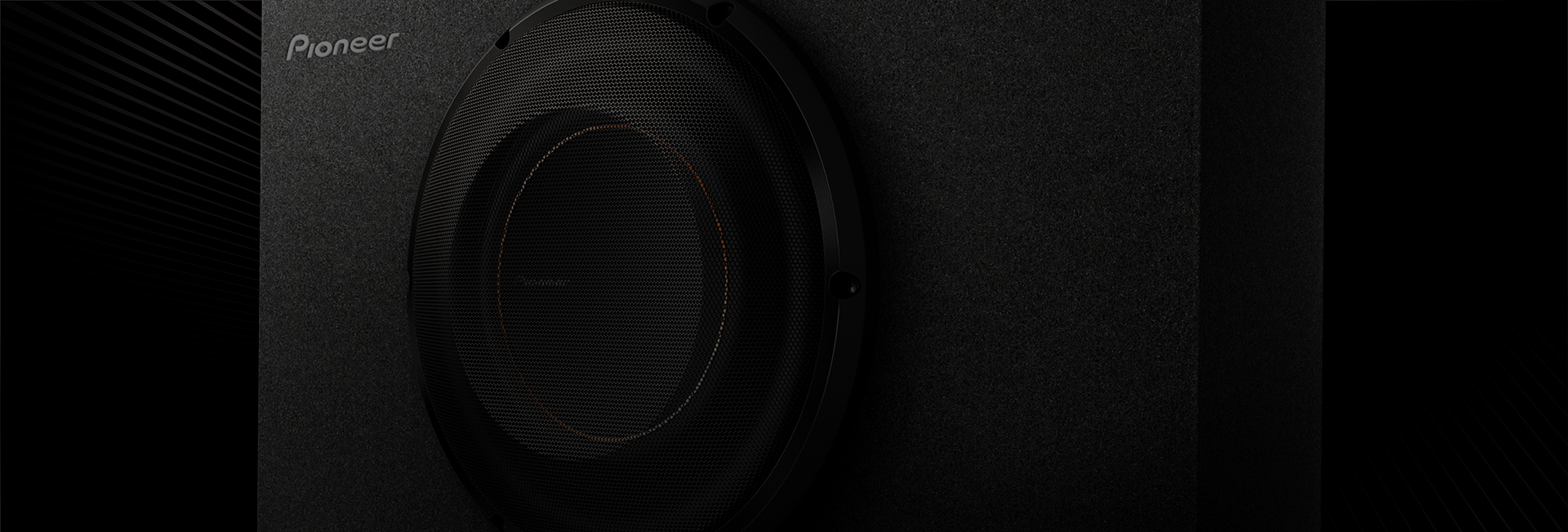 dark subwoofer on black background