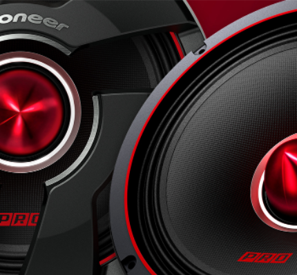 Close-up of Pioneer car subwoofers with red accents