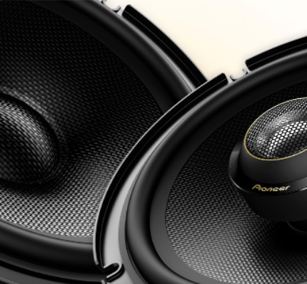 Close-up of a Pioneer car speaker with detailed view of the cone and grill.